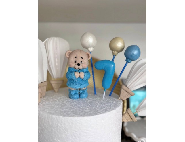 Ведмедик в пальті