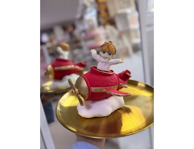 Малюк на літачку і хмаринці